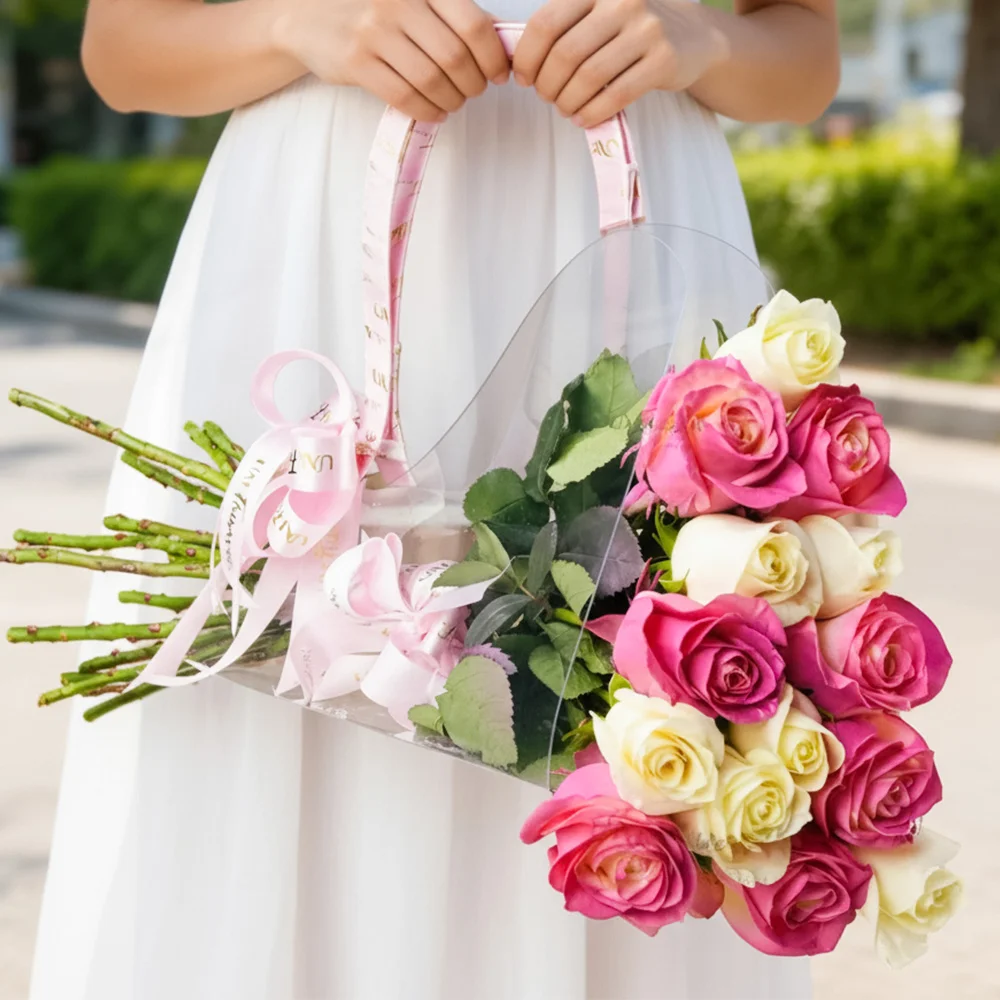 7 pink and 7 white roses in an acrylic bag tied with pink ribbons