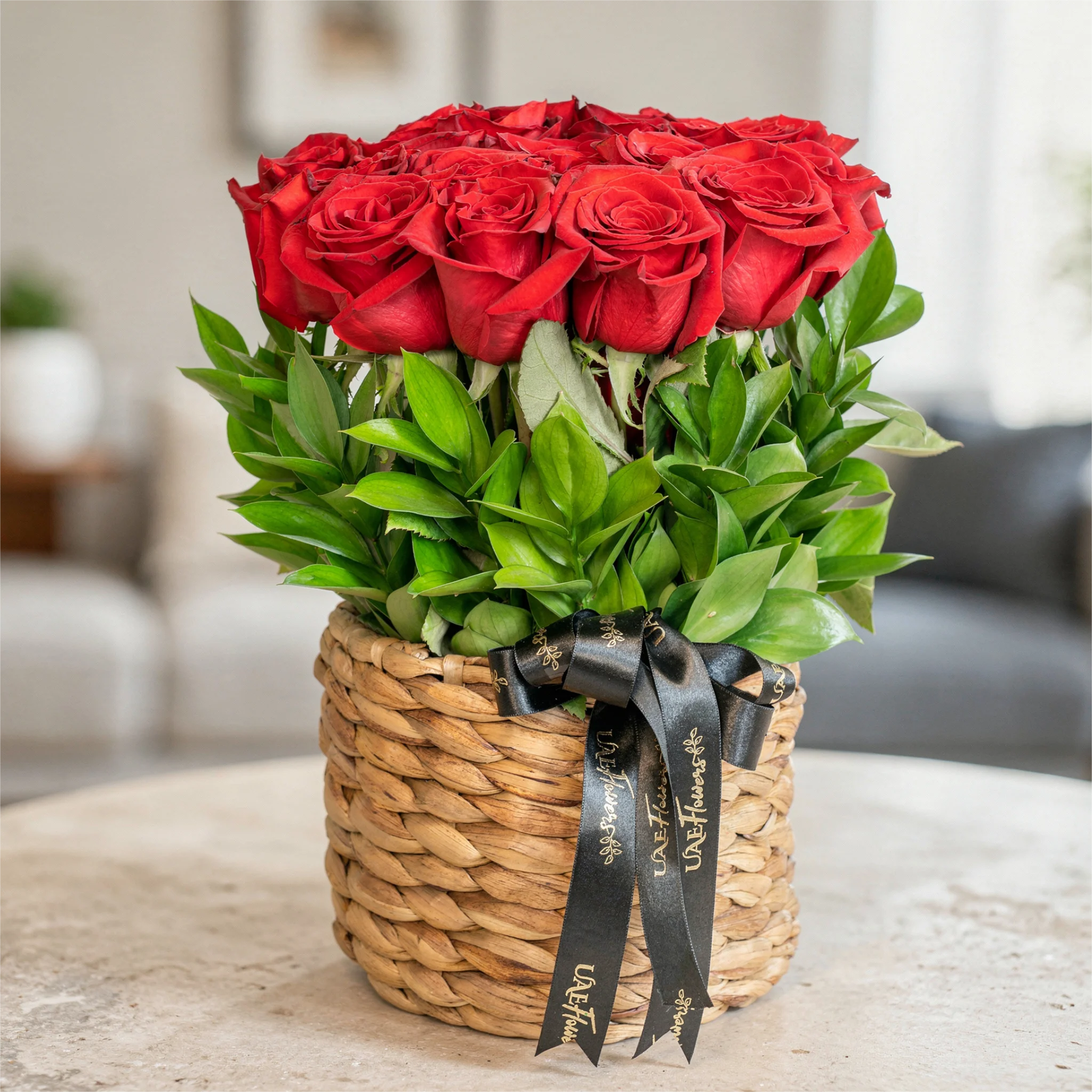 12 Red Roses in a Round Basket