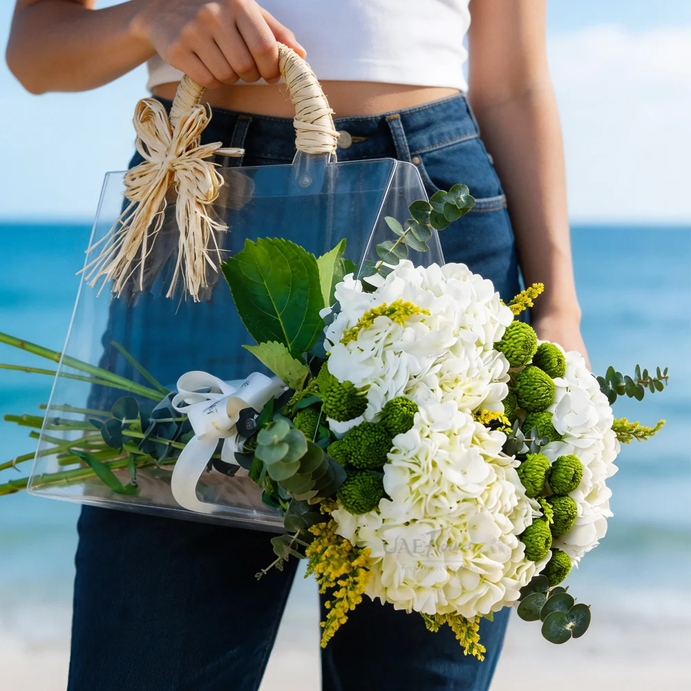 bag with 3 white hydrangeas and 2 green button chrysanthemums