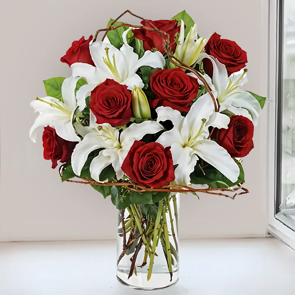 Bouquet with 3 stems of White Lilies & 10 Stems of Red Roses in nice wrapping