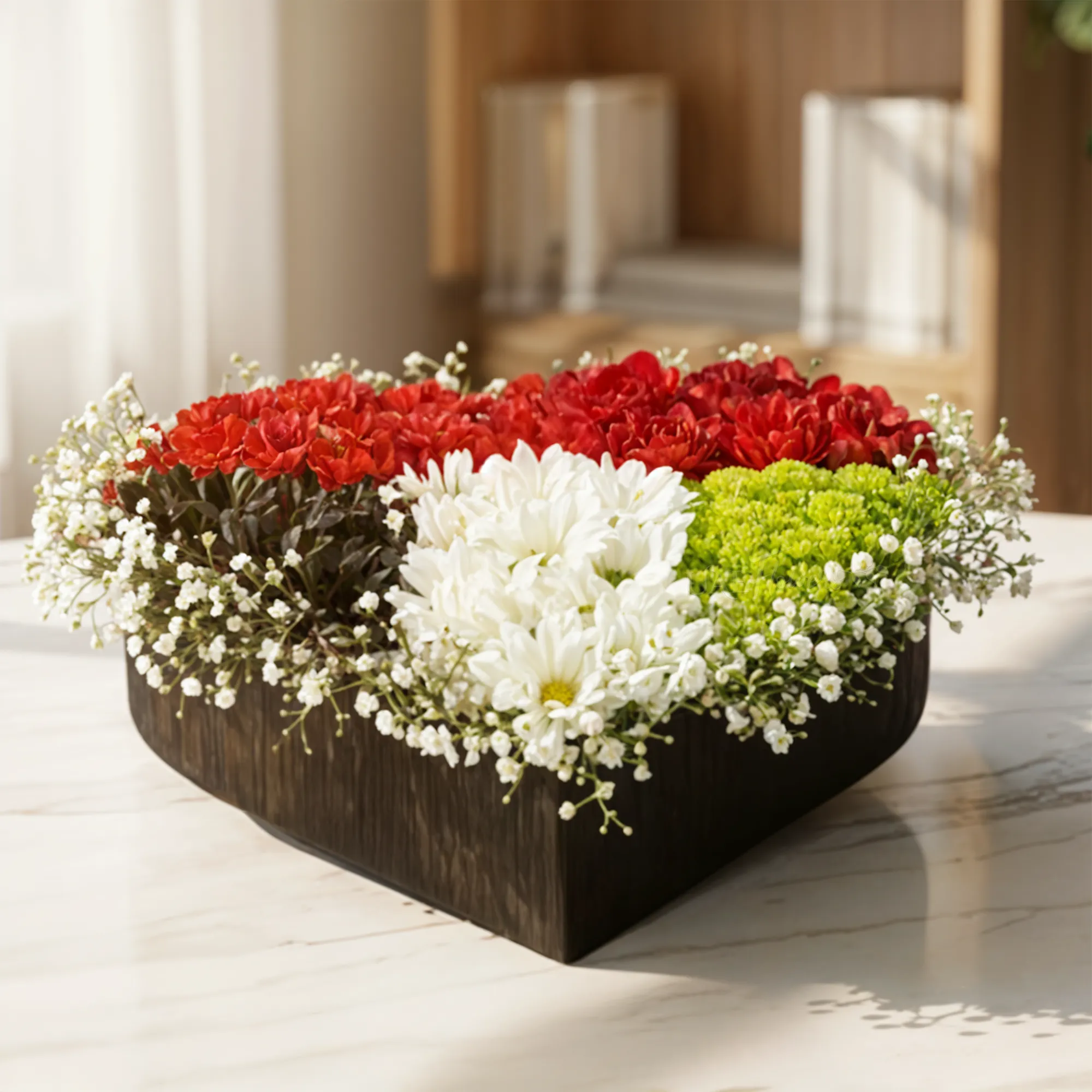 A 20 red carnation, 5 green chrysanthemum, 4 white, 4 black chrysanthemums, and gypsophila in a heart shape box