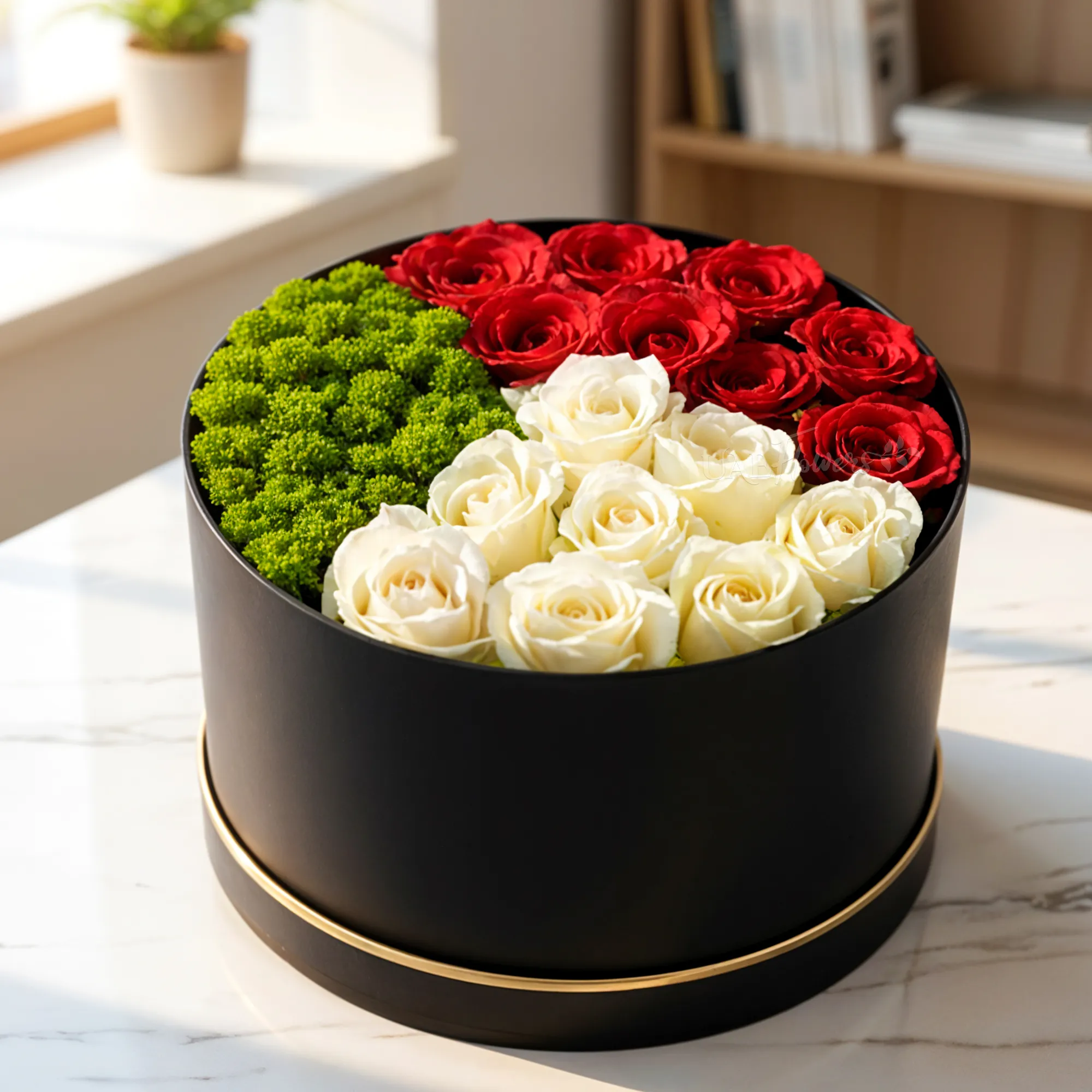 There are 16 red and white roses, along with 5 green chrysanthemums, arranged in a round black box
