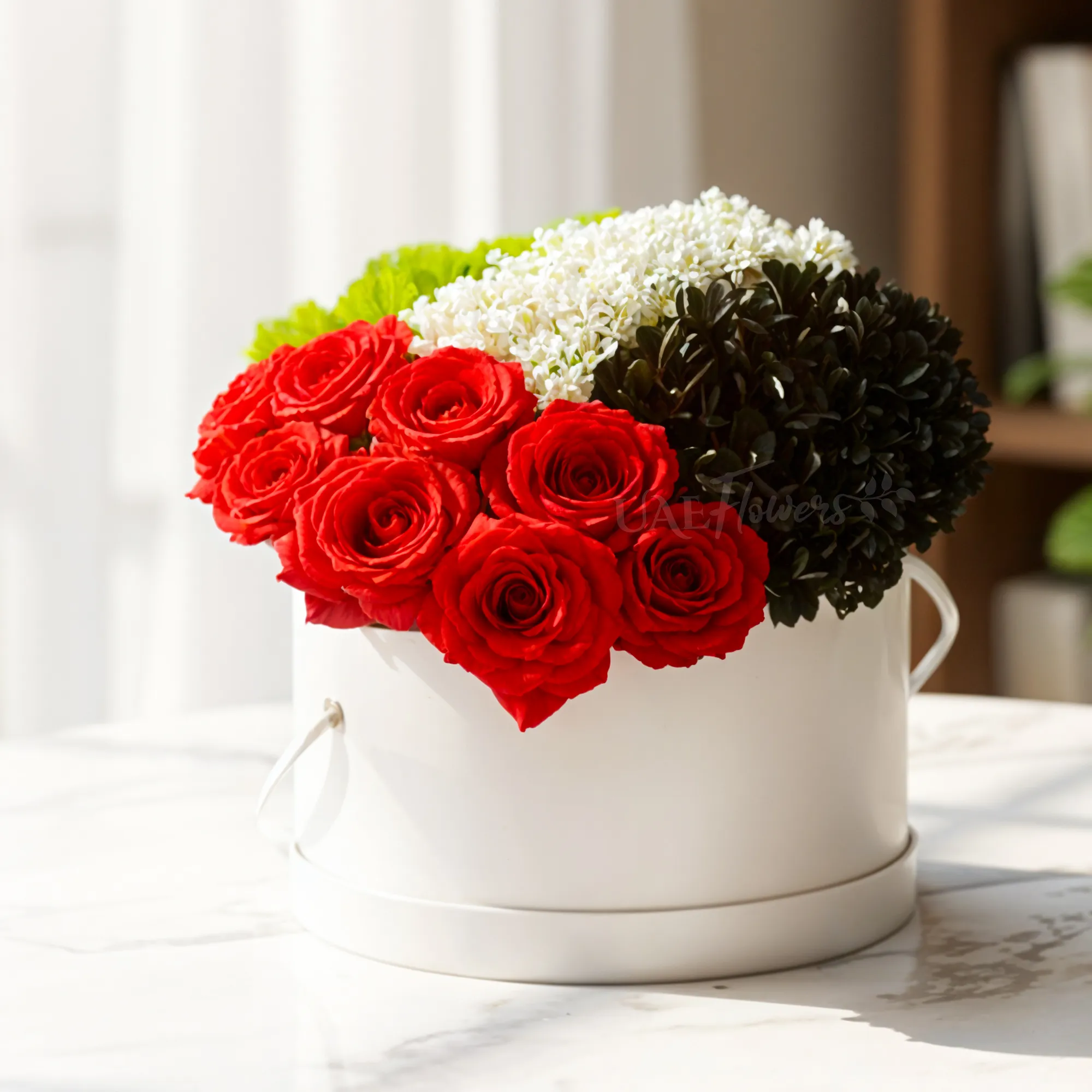 9 red roses, 5 black sprayed chrysanthemums, 5 green chrysanthemums, and gypsophila in the centre in a white round box