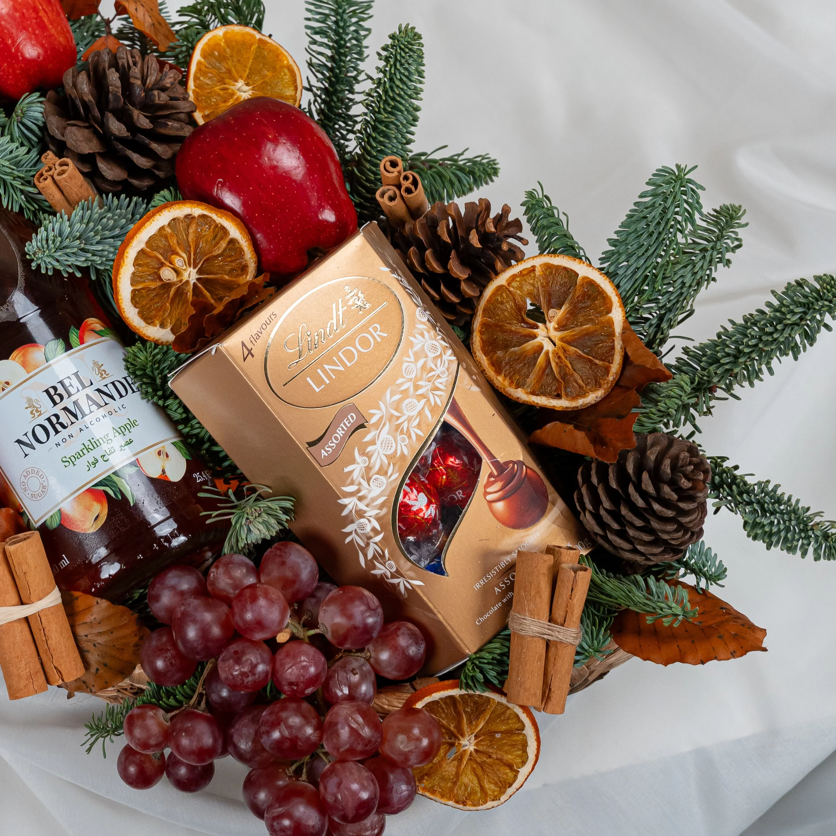 Festive Orchard Delight Crate with fruits, chocolate and Christmas decor