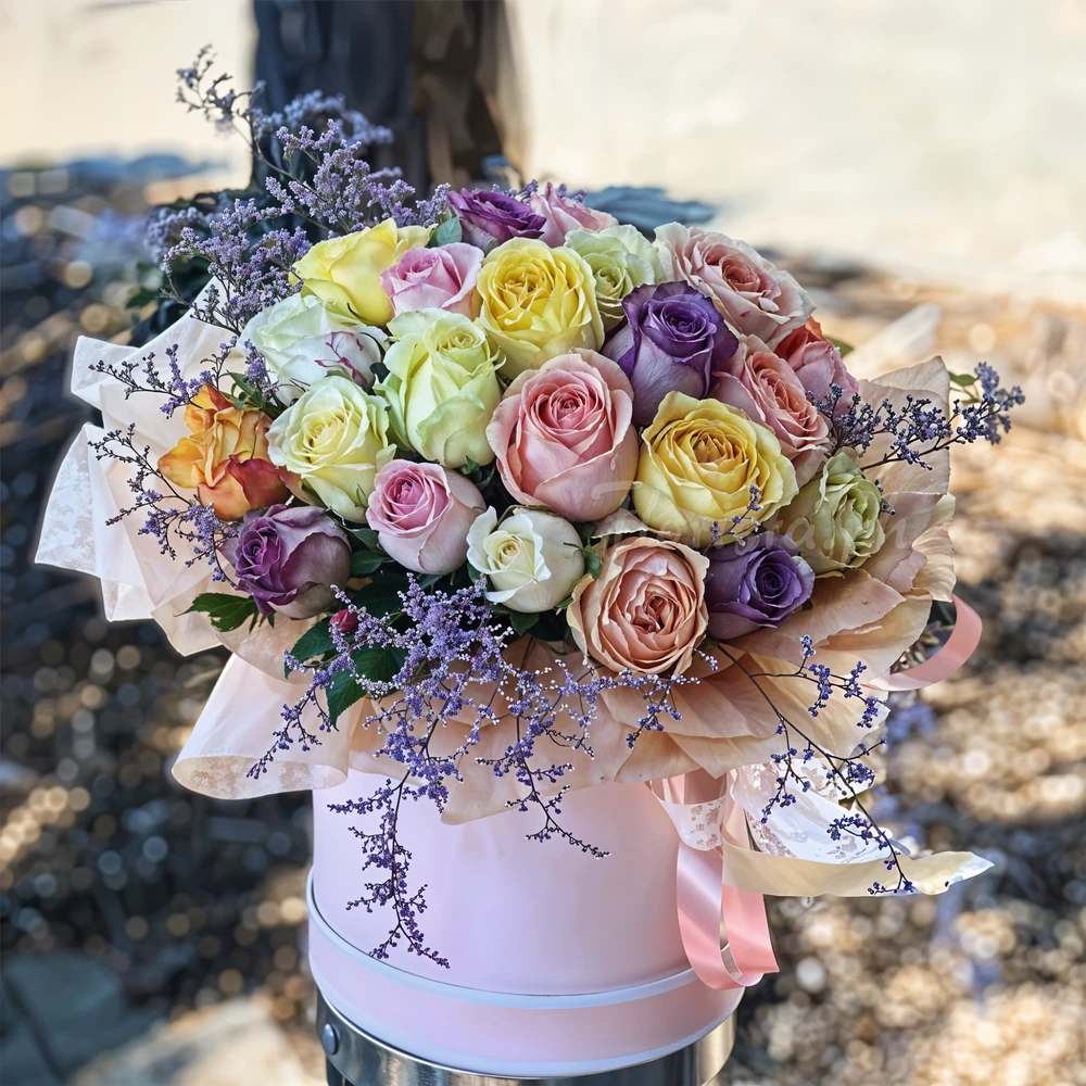 20 mix color roses with fillers in a round box