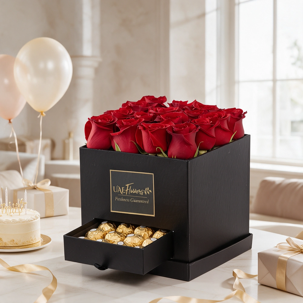 Black gift box with 16 red roses and 16 Ferrero Rocher chocolates, perfect for romantic occasions, anniversaries, or expressing love.