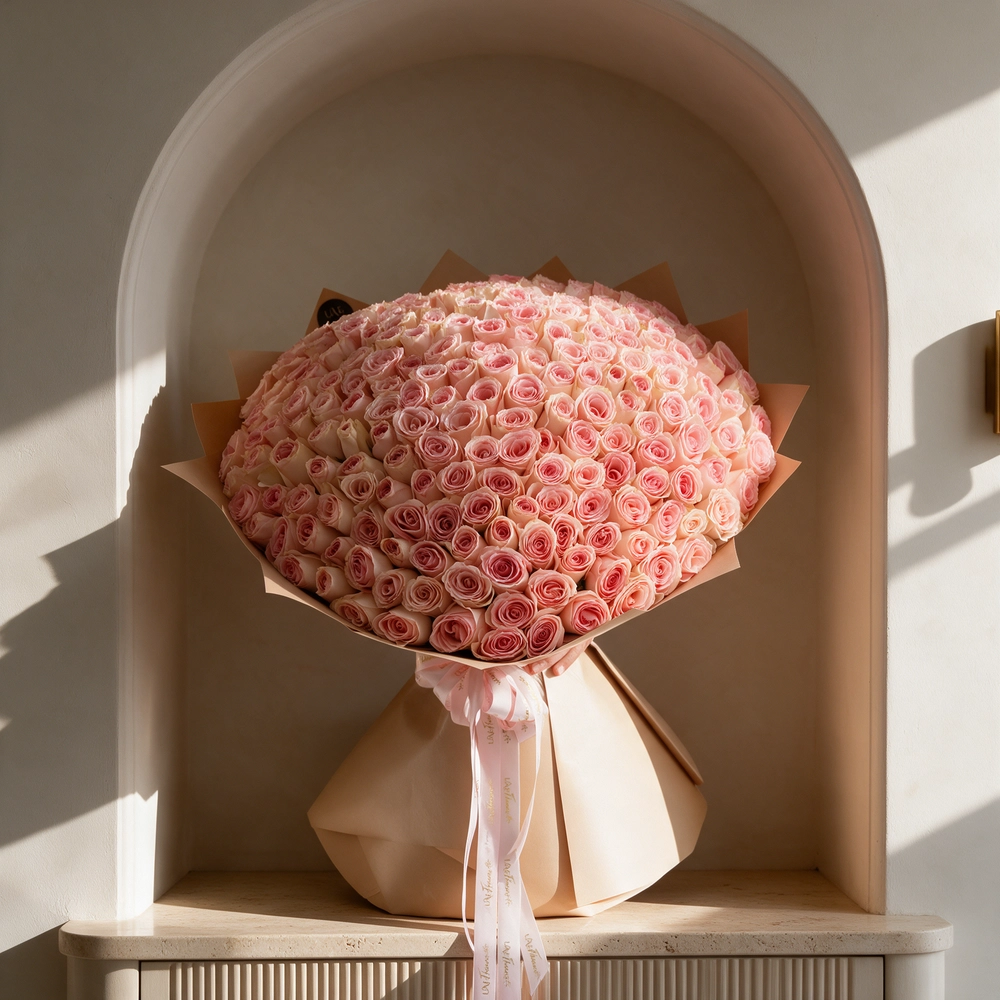bouquet of 200 pink roses arranged with soft fillers