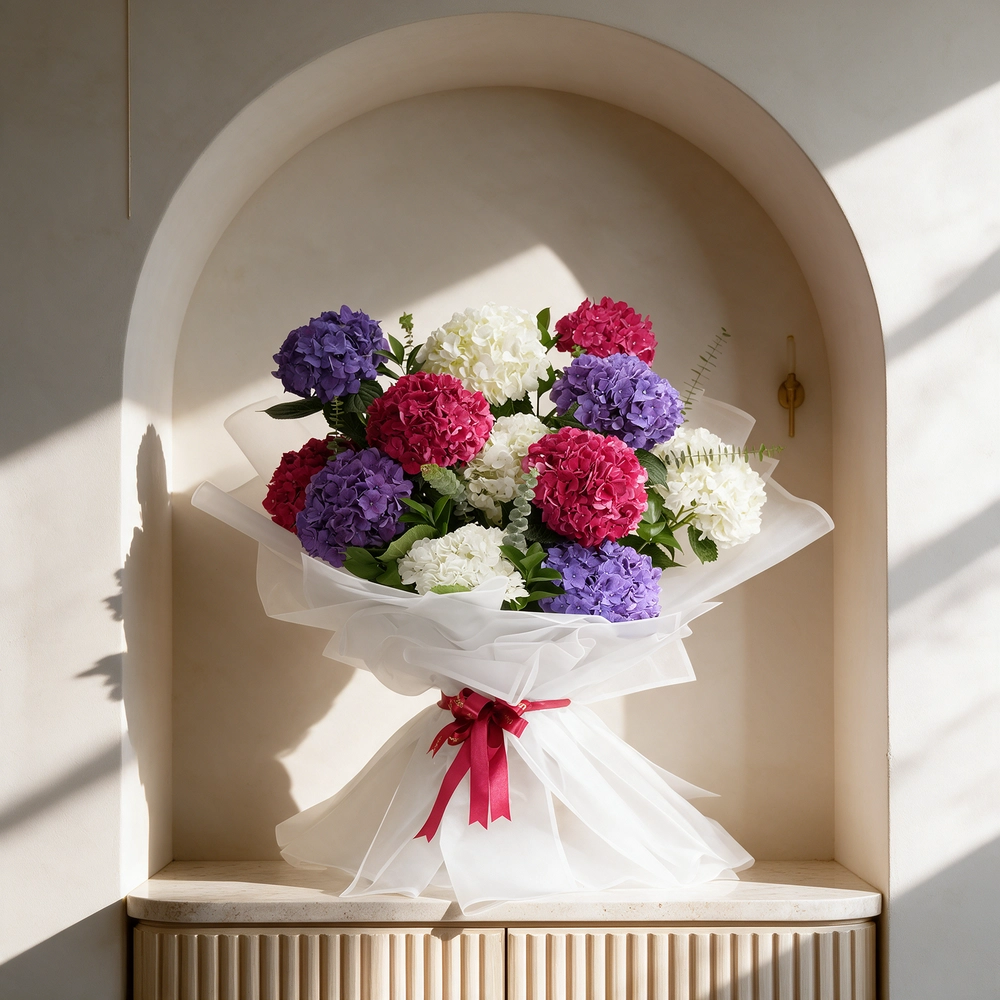 bouquet with red, white, and purple hydrangeas