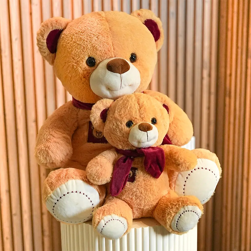 1 small & 1 medium size brown teddy bears