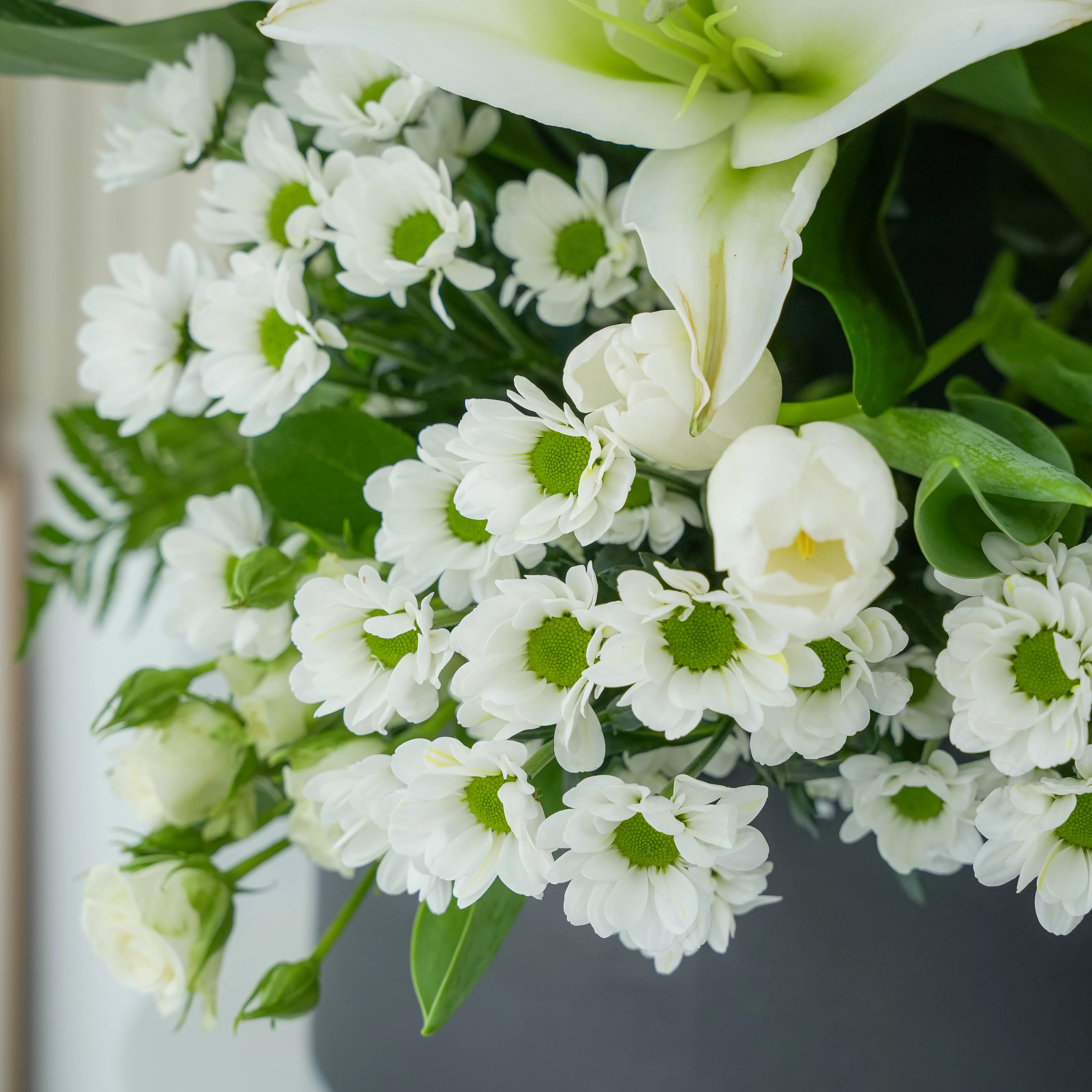 White Floral Arrangement in Black Box
