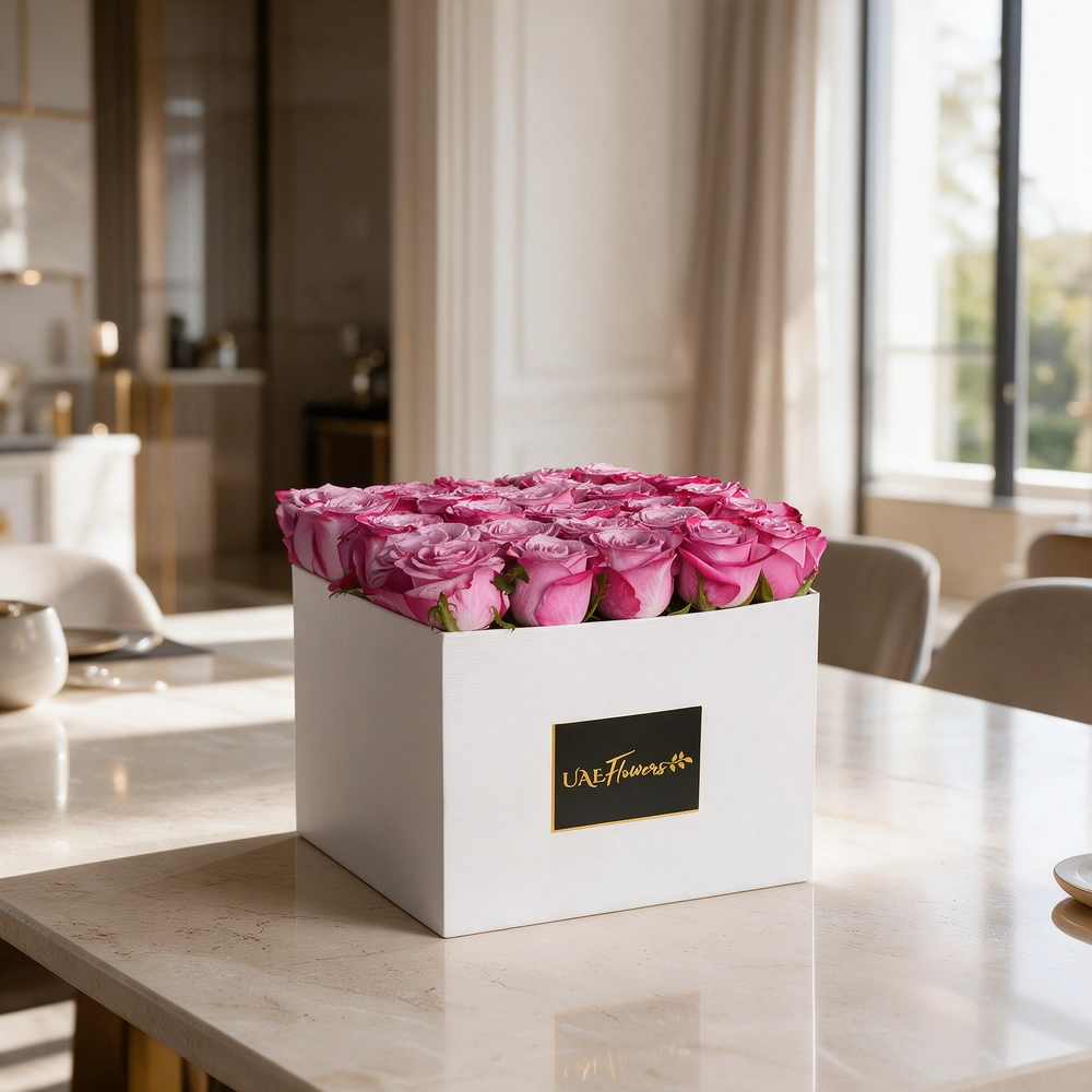 30 purple roses arranged in a white square box