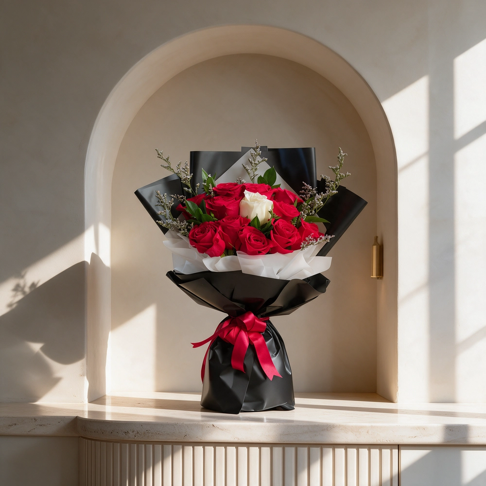 12 red roses and 1 white rose