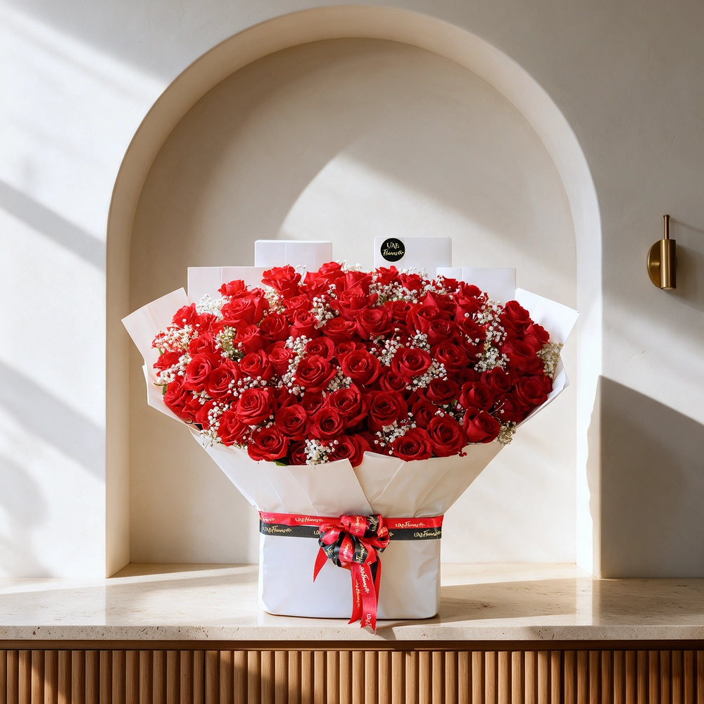 Bouquet of of 100 red roses with baby’s breath